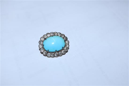 A Victorian yellow metal brooch, with oval turquoise cabochon surrounded by old-cut diamonds, 23mm.